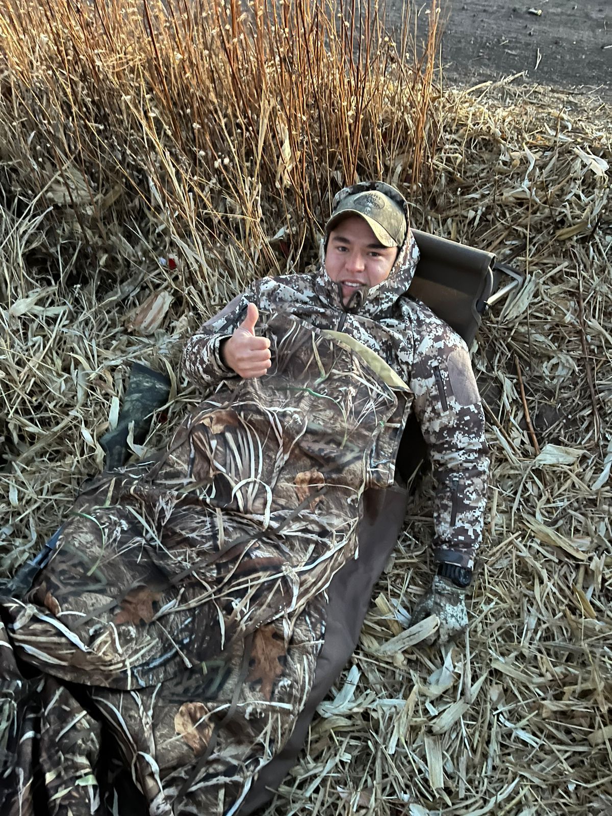 Waterfowl hunters with dog